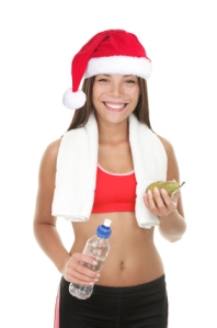 Fitness woman with christmas hat